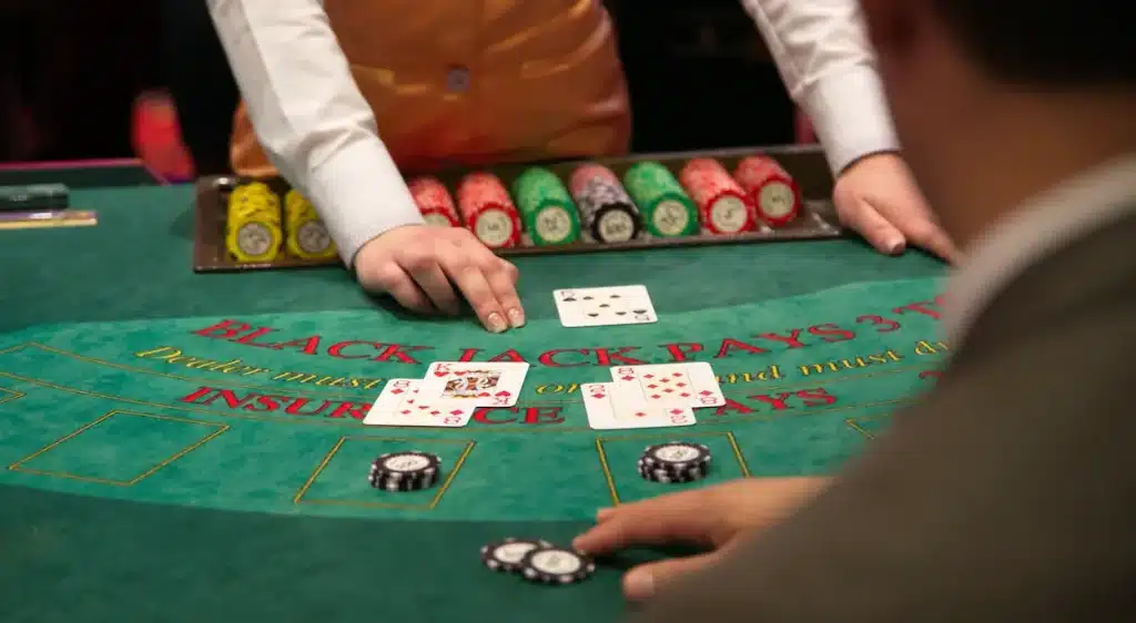 Blackjack game in action with player deciding to hit or stand.